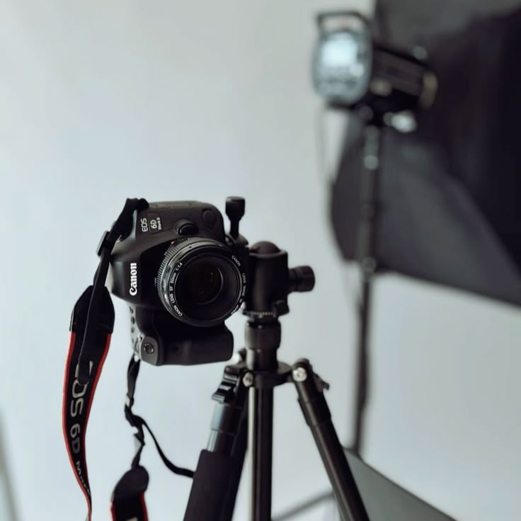 Professional photography setup with camera and laptop running photo editing software 03